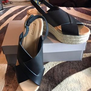 Open toe black leather platforms